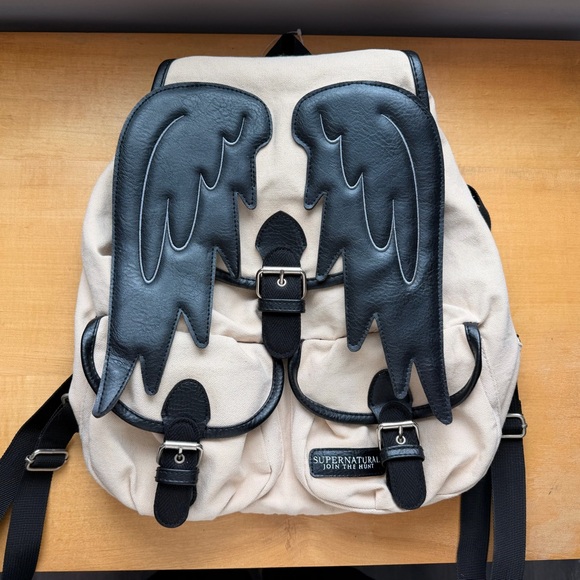 Hot Topic Handbags - Supernatural Castiel Wings Slouch Backpack